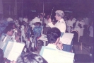 General Eva Burrows conducts the band